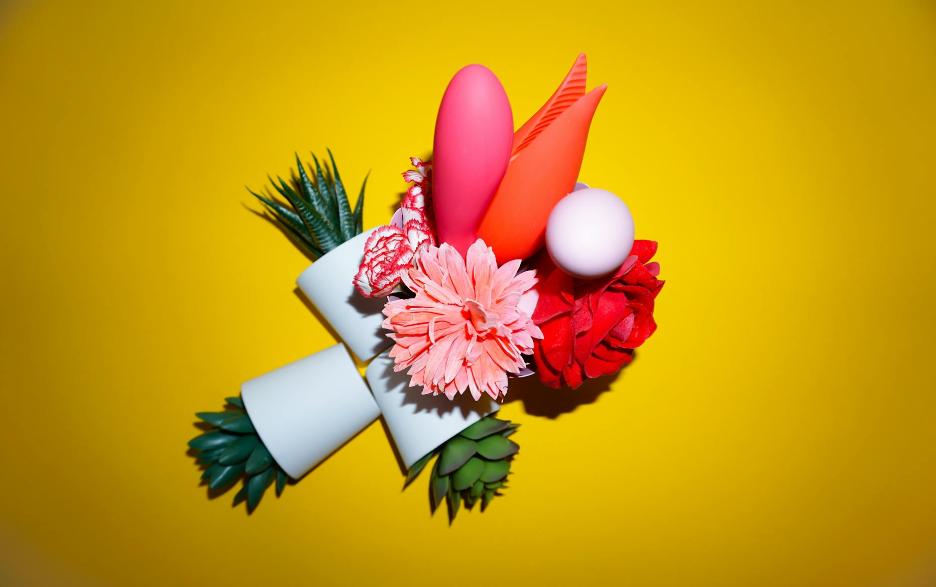 Two vibrant lemons against a minimalistic white background, symbolizing freshness and renewed pleasure